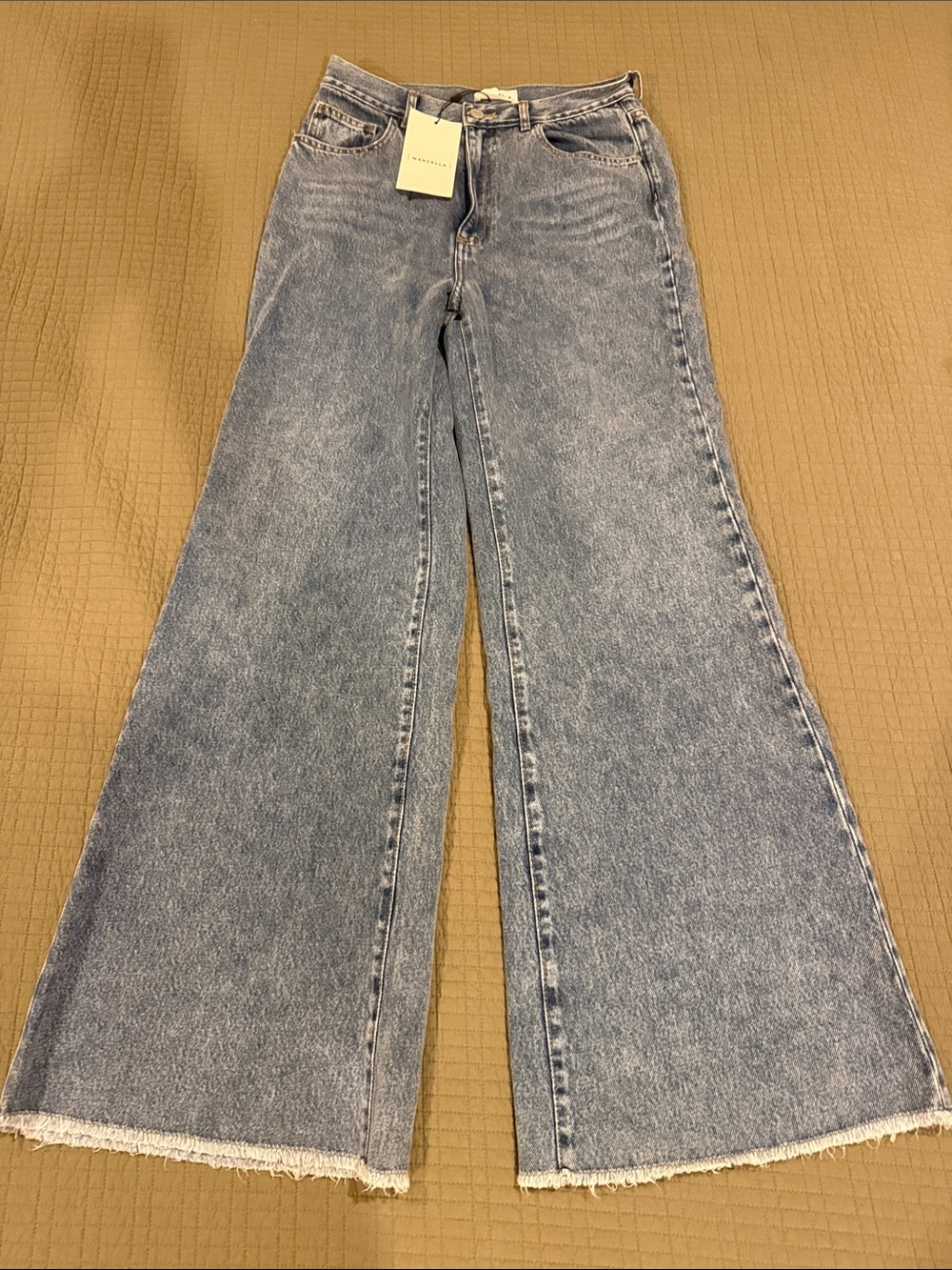 Wide-Leg Light Blue Flared Jeans with Frayed Hem